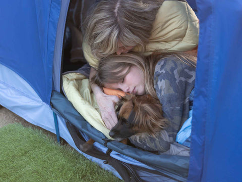 SURF REV TENT GROUND MOM AND DOG SLEEP